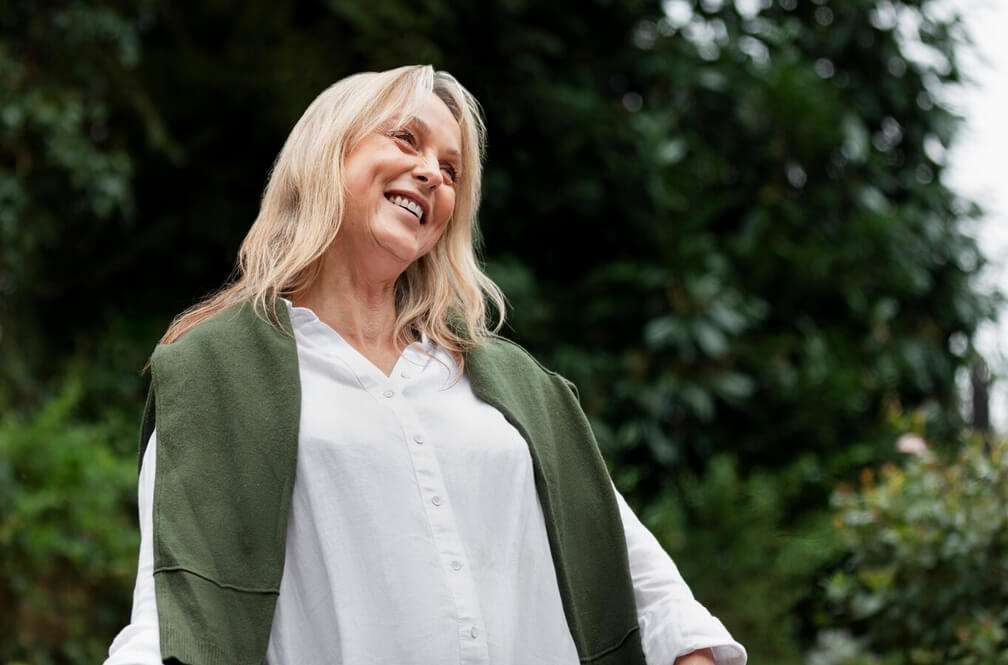 senior woman in garden enjoying her day 