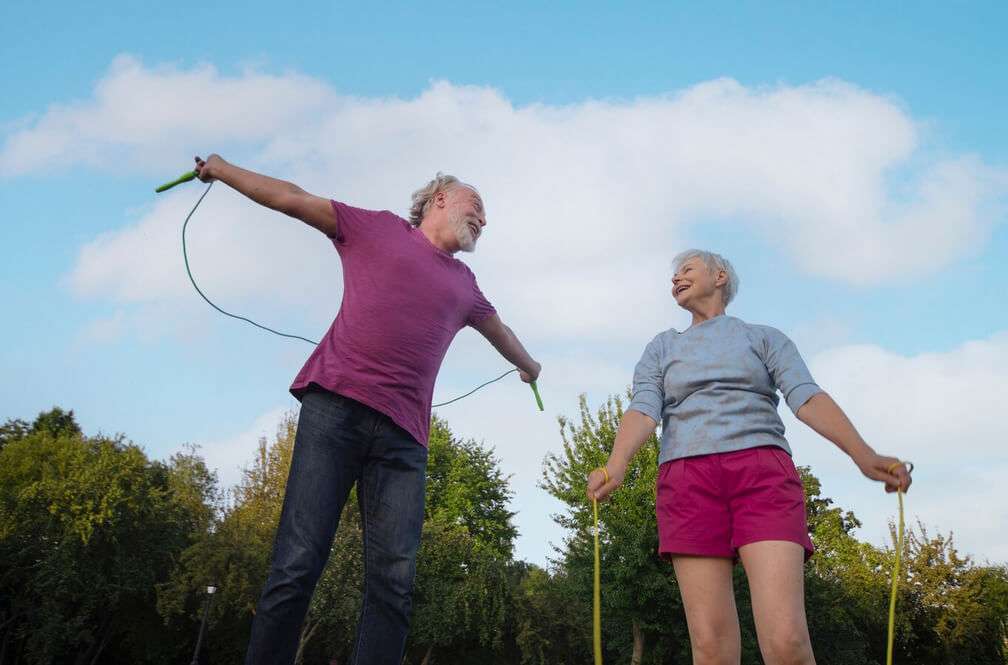 senior couple staying active outside