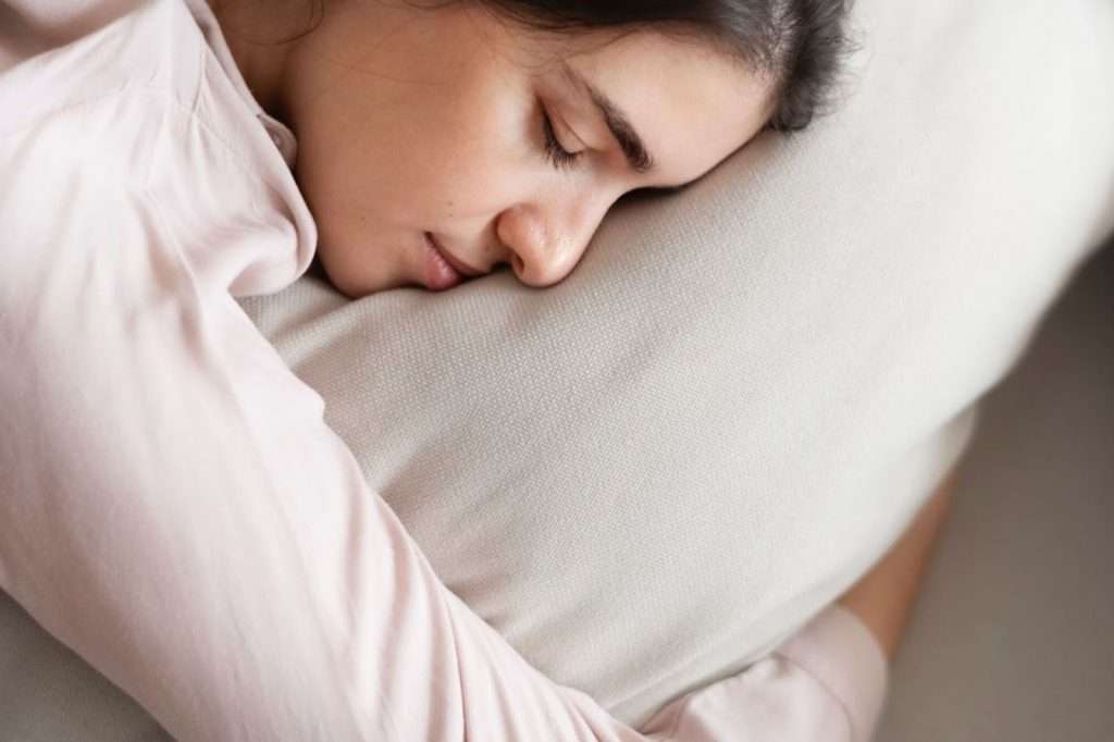 woman sleeping on the pillow