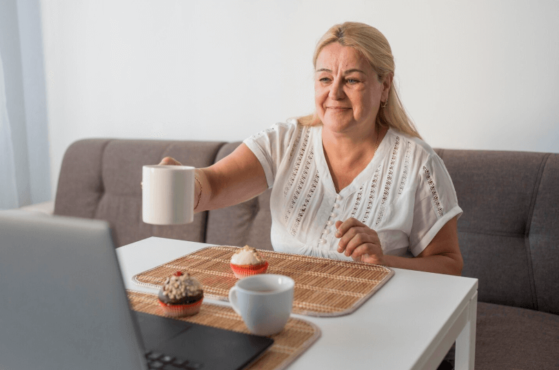 woman holding cup of coffe
